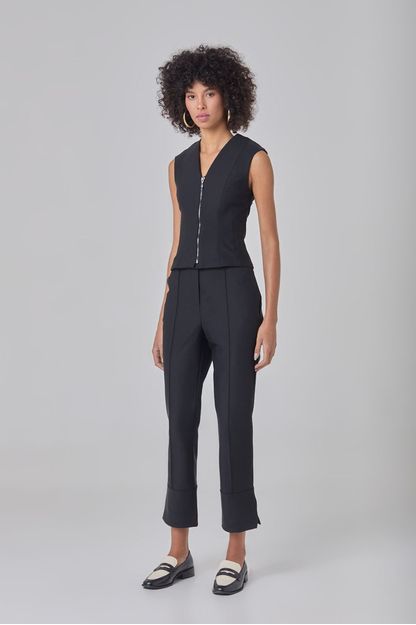 Calça slim com fenda lateral em malha block preta