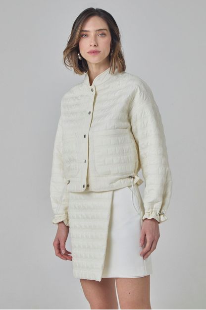 Saia malha compact com matelassê off white
