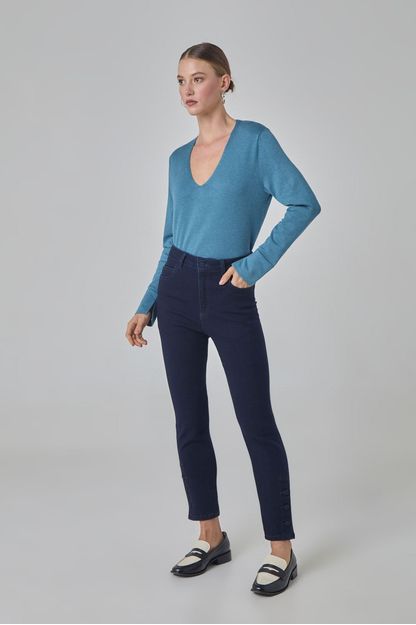 Calça slim barra com botões em denim azul escuro