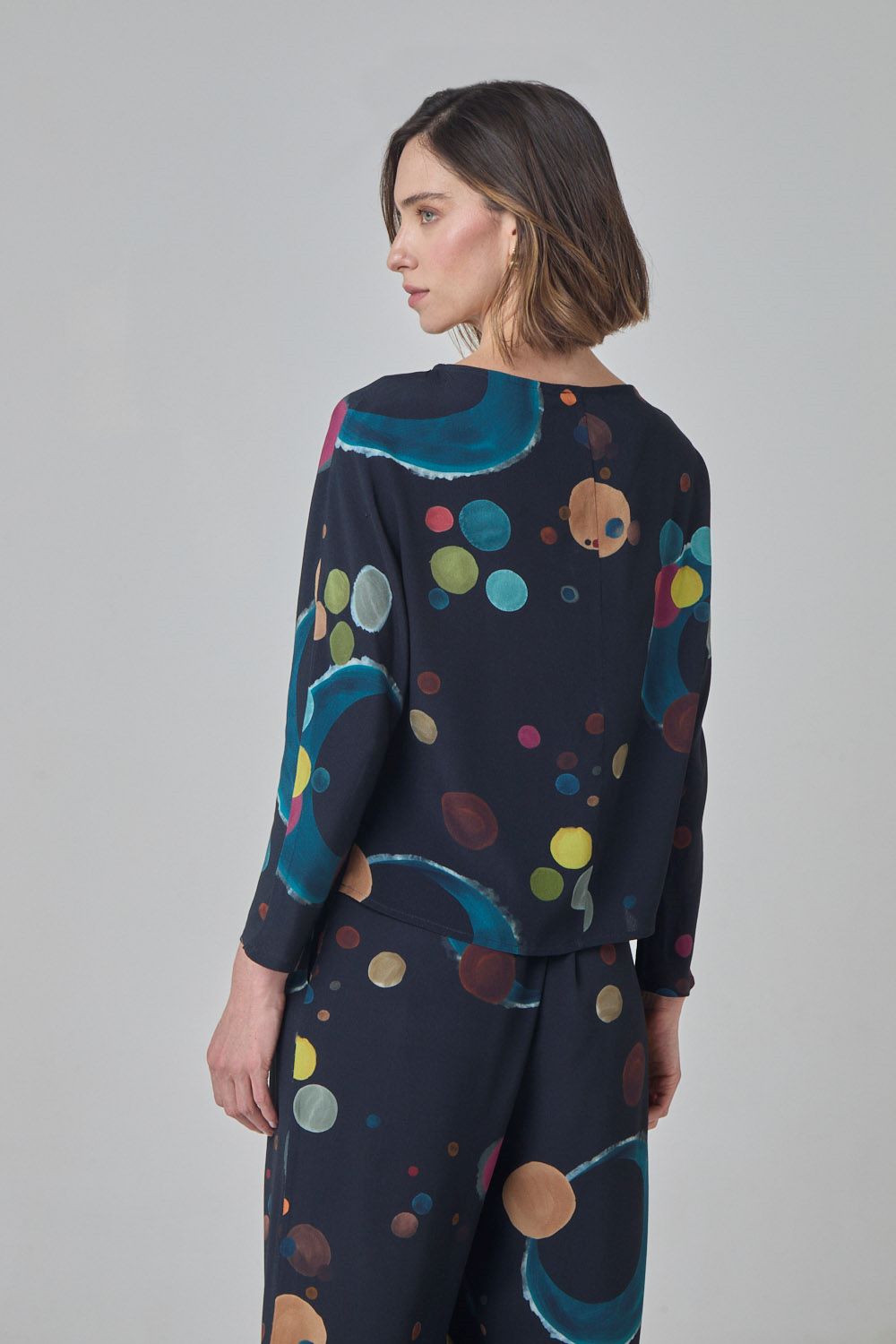 Blusa manga morcego estampa eclipse
