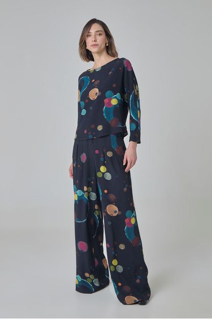 Calça pantalona com pregas estampa eclipse