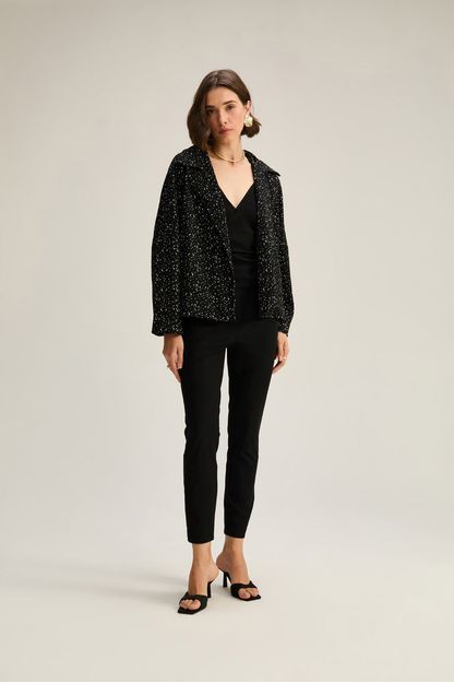 Calça slim em supermotion preta