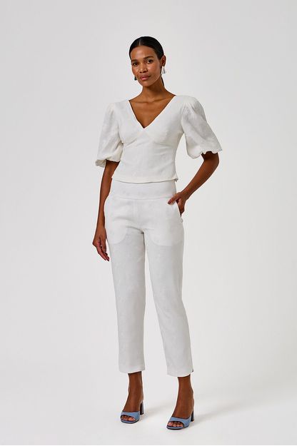 Calça com pala em linho caramujos